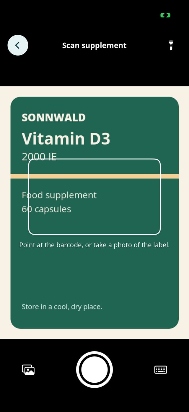 The Zyva scanner pointed at the label of a fictional vitamin D3 product.